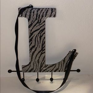 Justice “L” jewelry wall hanger